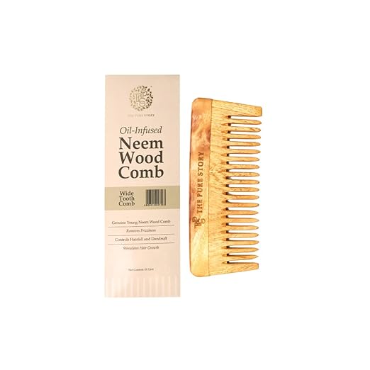 Oil–Infused Neem Wood Comb treated with a combination of Herbs and Cold-Pressed Oils.(Wide Tooth Comb)